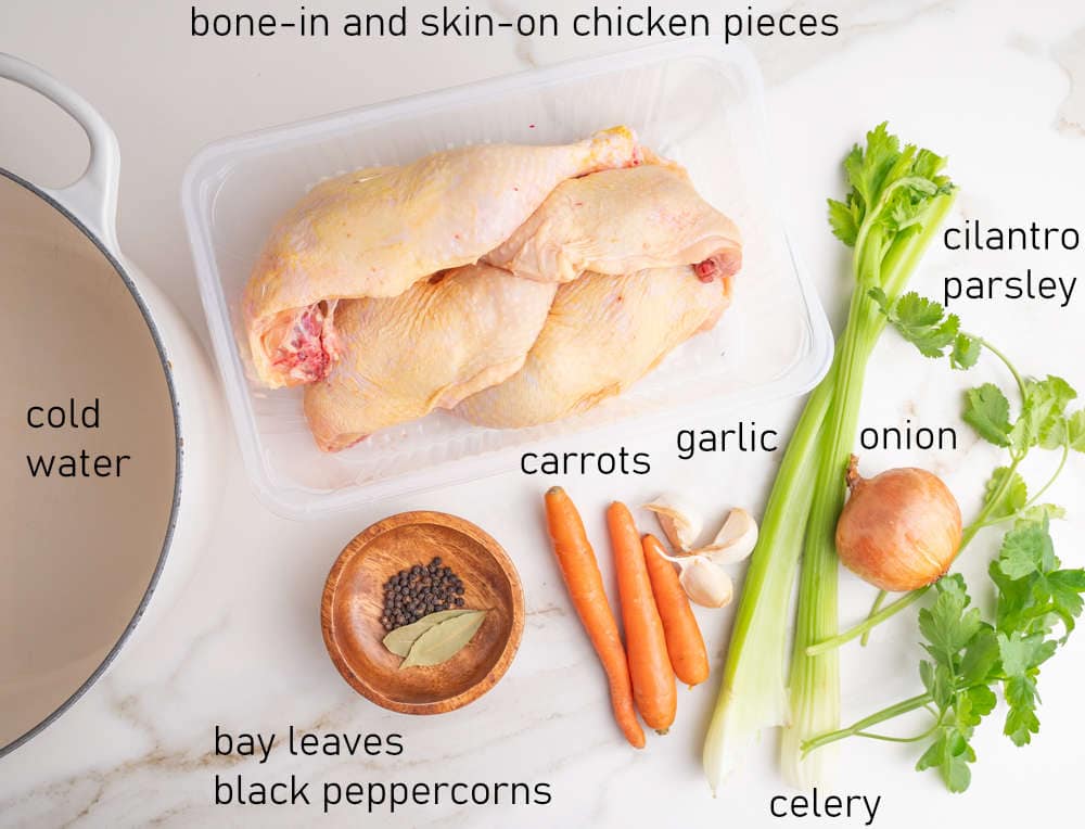 Labeled ingredients for homemade chicken broth.