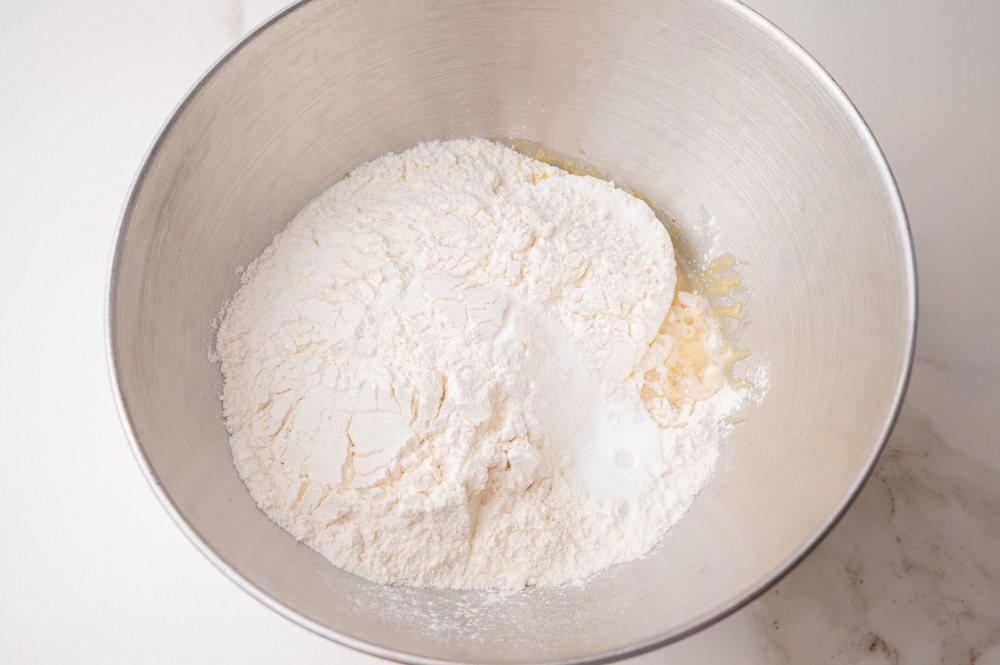 Ingredients for oponki donuts in a metal bowl.