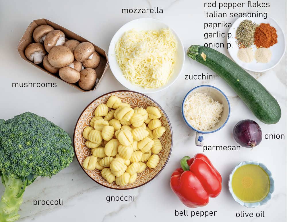Labeled ingredients for sheet pan gnocchi and vegetables.