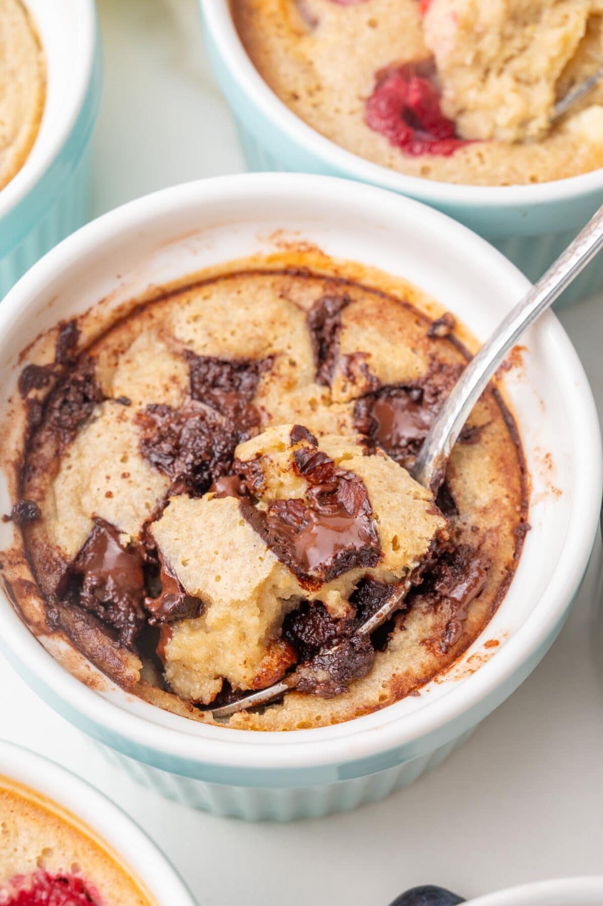 Chocolate chip baked oats in a smal lblue ramekin.