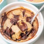 Chocolate chip baked oats in a smal lblue ramekin.