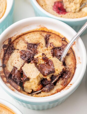 Chocolate chip baked oats in a smal lblue ramekin.