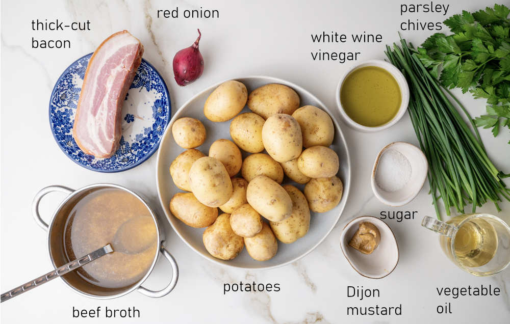 Labeled ingredients for German potato salad.